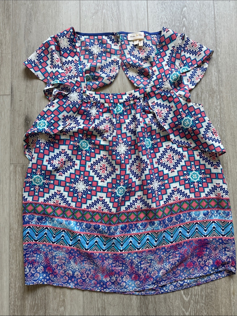 Women’s flutter sleeve blouse